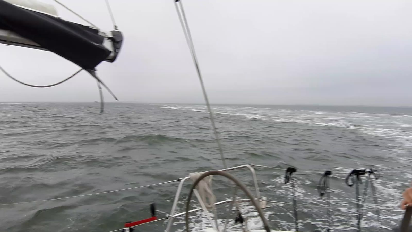 Task-B skipper Bart Nieborg at the helm of a sailing yacht