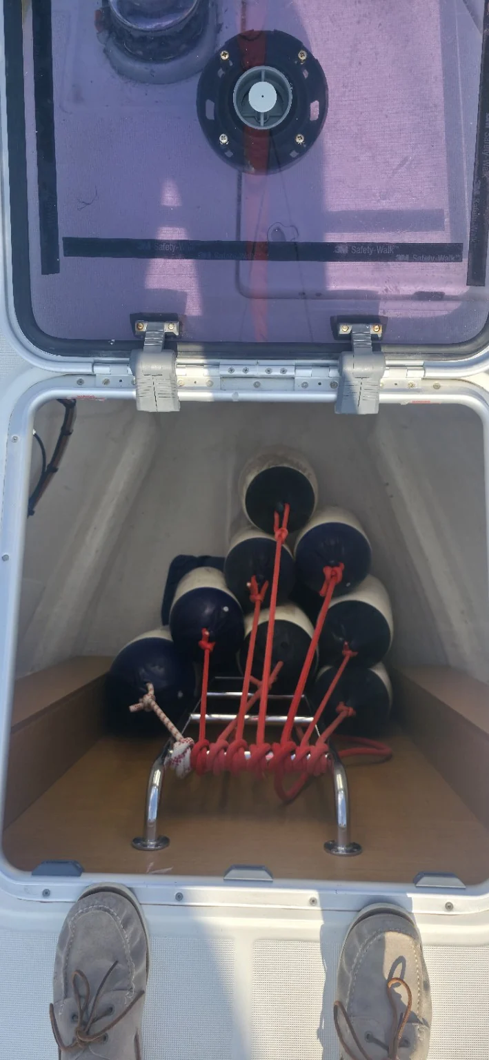 Organised yacht fender locker prepared for professional charter operations