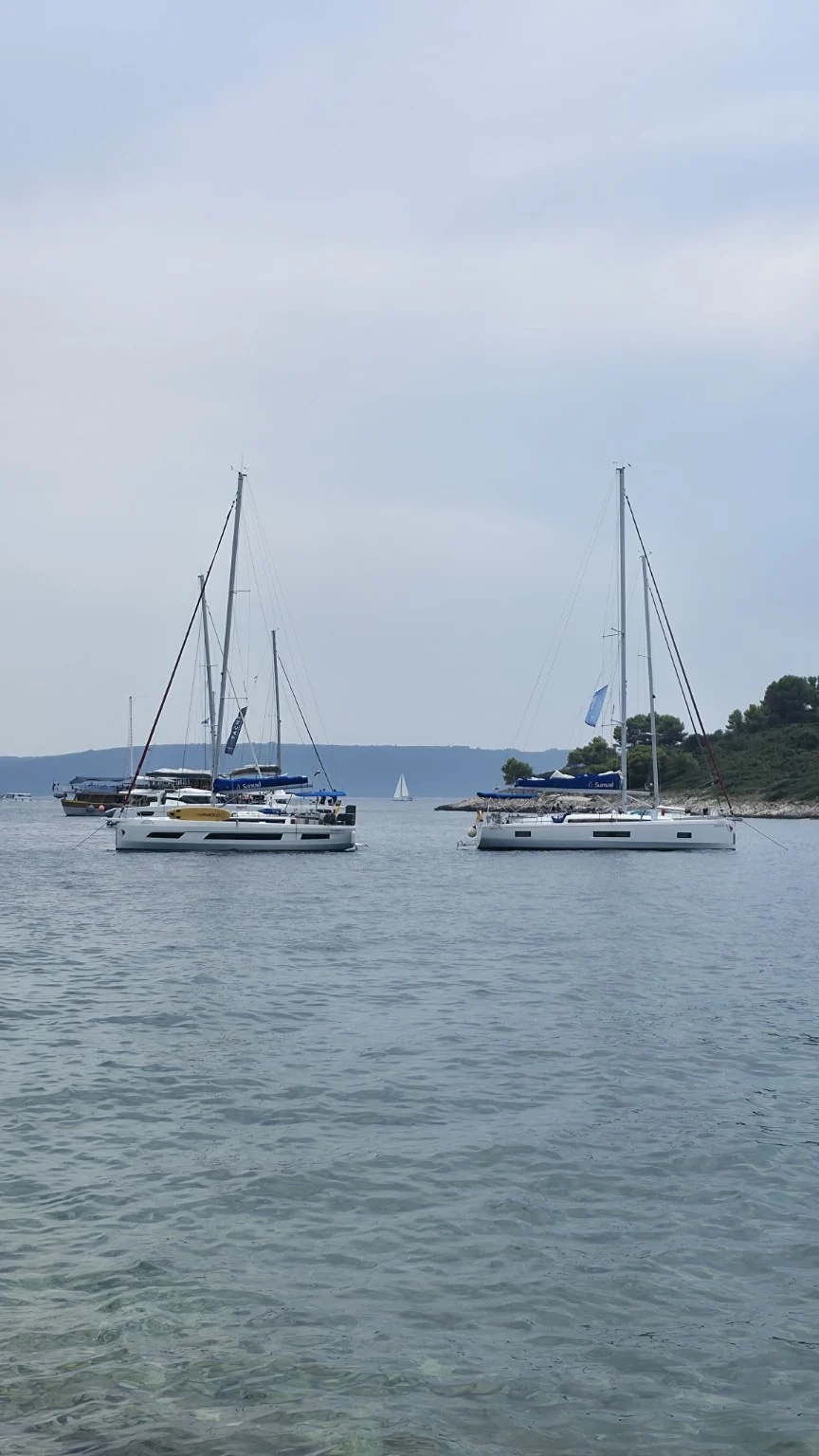 Sailing yachts at anchor in Fumija between Čiovo and Fumija
