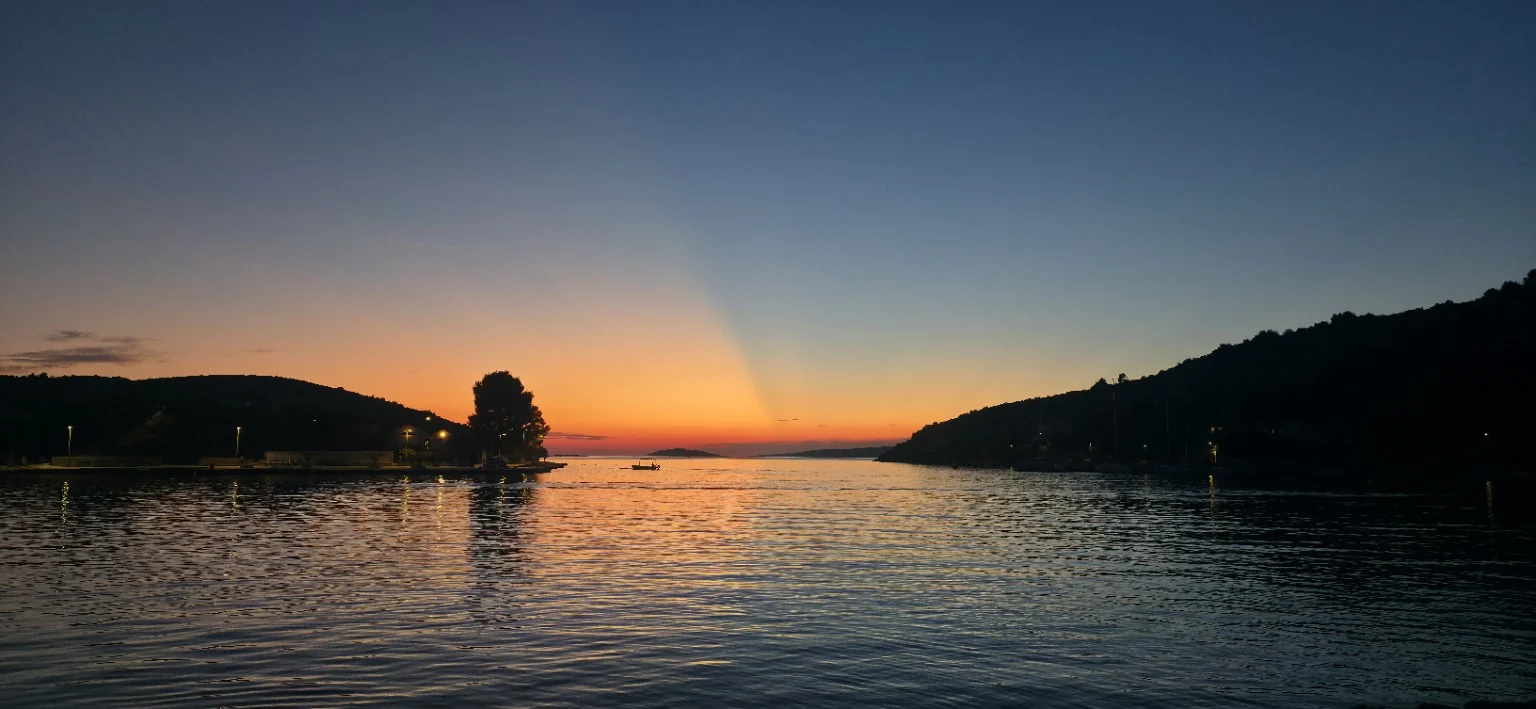 Bobovišće bay at sunset during a sailing holiday on Brač