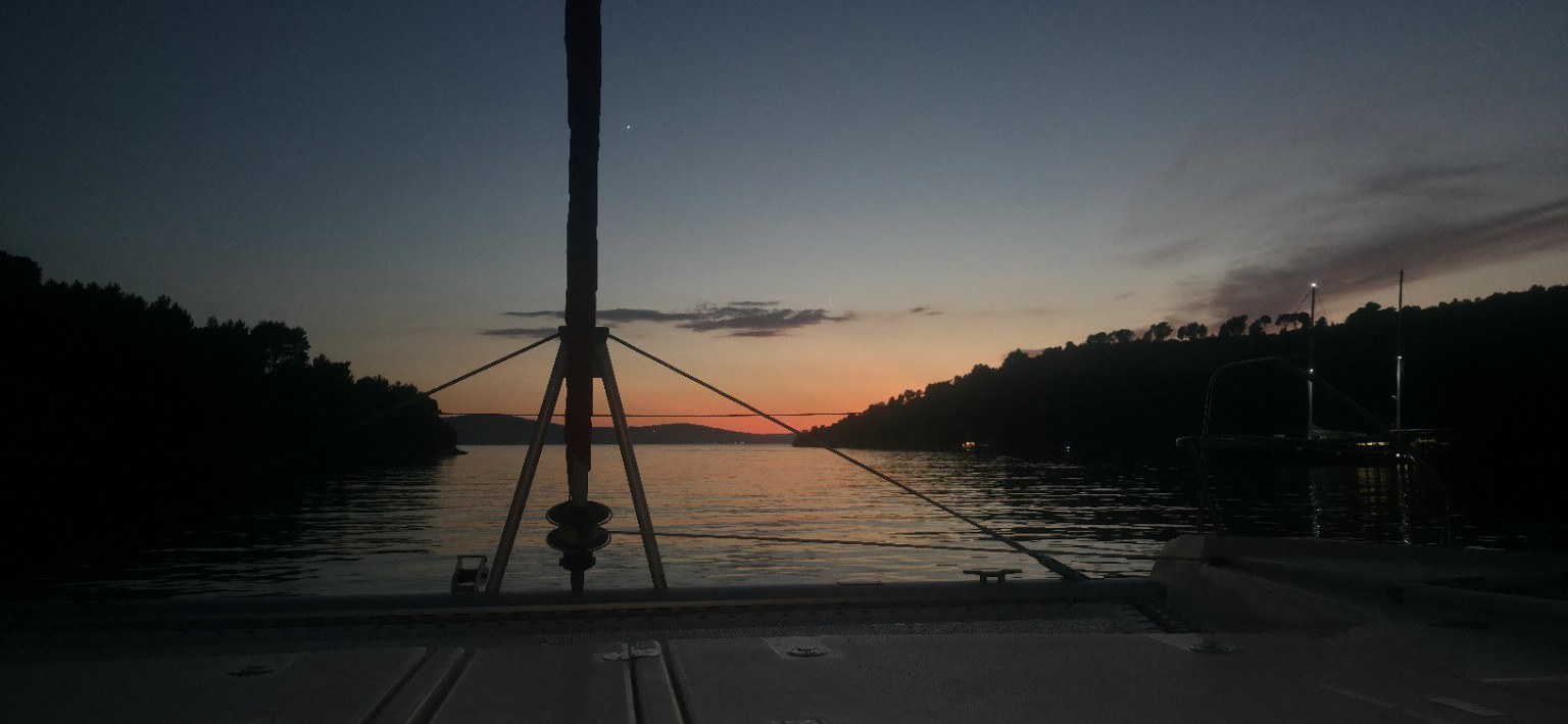 Sunset from a sailing yacht in Bobovišće on Brač